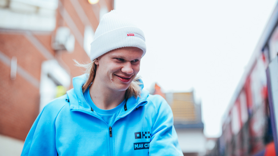 HAPPY HAALAND : Erling in good spirits when arriving at the stadium.