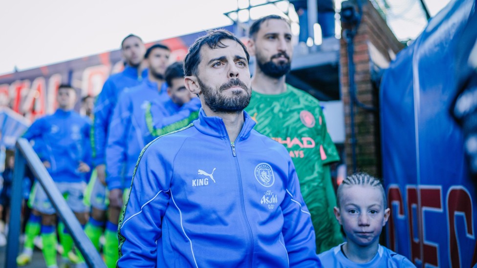 LEADING FROM THE FRONT: Bernardo Silva guides the team out