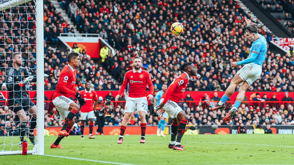 UP AND AT EM: Grealish heads home