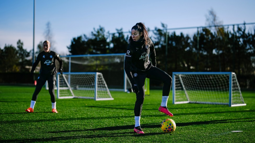 BEHIND YOU! : Ouhabi holds onto the ball