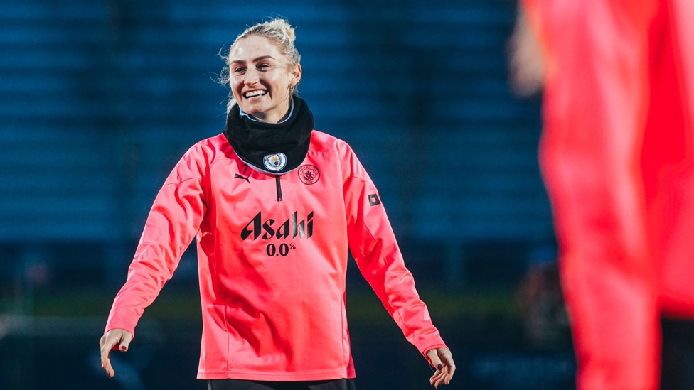 ALL SMILES : Laura Coombs enjoys herself as the session continues