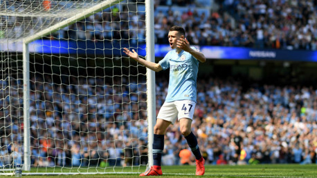 GOALDEN VISION: Phil Foden starts the celebrations after heading City into an early lead
