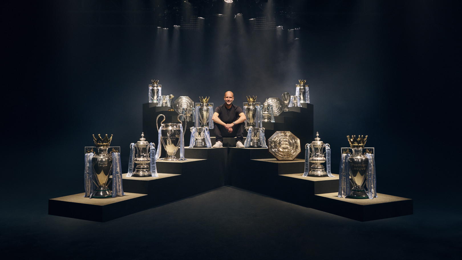 Pep Guardiola image celebrates 10 years and 20 trophies