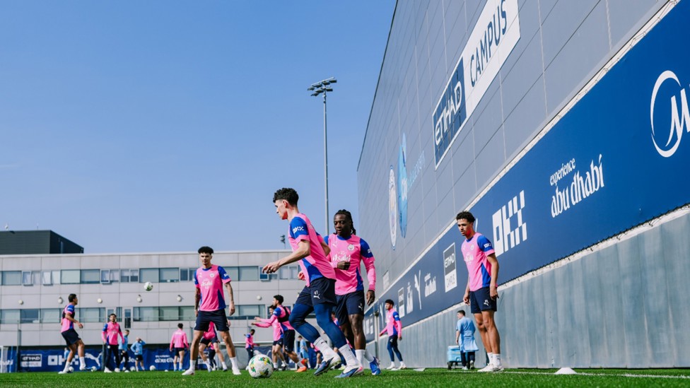 SQUAD GOALS: Phil Foden leads the way through this drill.