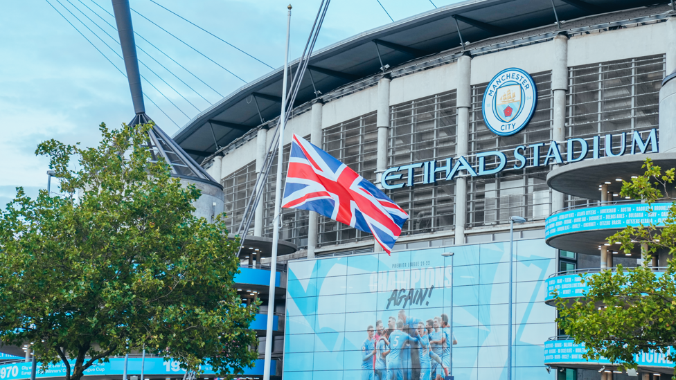 RESPECT : The Union flag flies at half mast in tribute to Queen Elizabeth II outside the stadium.
