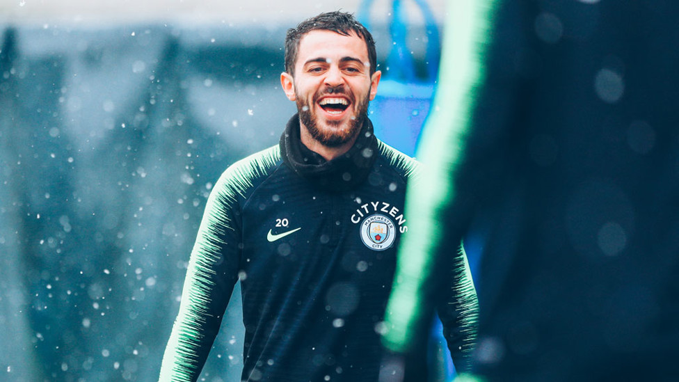 SILVA SHINES : Bernardo is in buoyant mood as the snow falls all around
