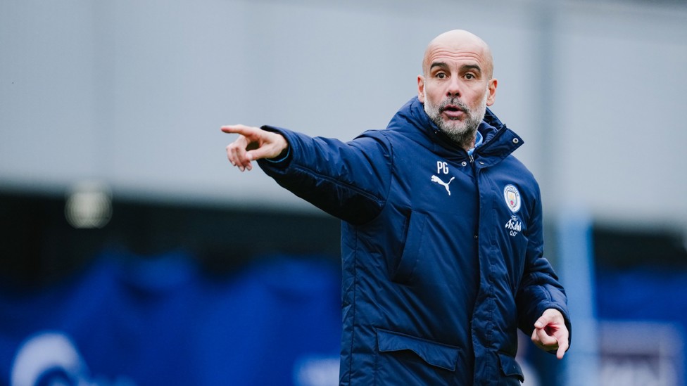 PEP TALK : Pep Guardiola dishes out some instructions