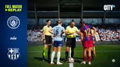 Players from Manchester City and Barcelona at the center of the field for a coin toss before a match. Referees and team captains are also present. Manchester City and FC Barcelona logos are visible on the left.
