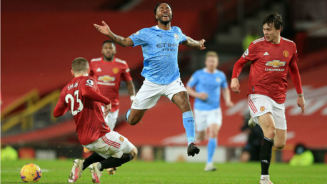 FRUSTRATION: As Luke Shaw nicks the ball off Raheem Sterling