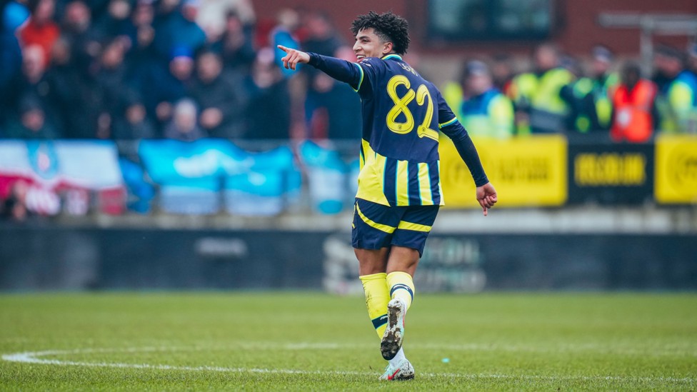 A HELPING HAND : Rico Lewis celebrates his assist for Abdukodir Khusanov in our FA Cup win over Leyton Orient.