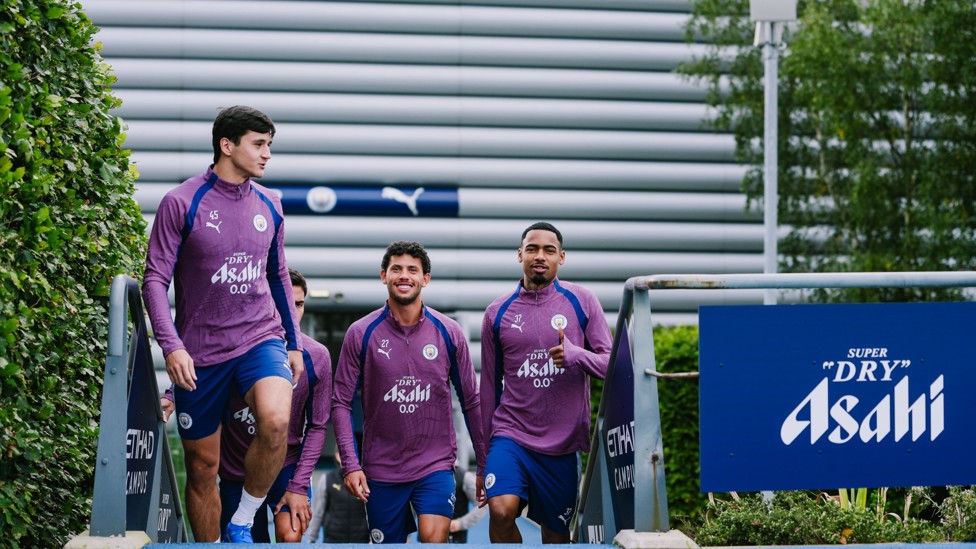 THUMBS UP : Allan Elias, Abdukodir Khusanov and Matheus Nunes on their way to training 