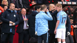 BLOW: The boss consoles Kevin De Bruyne after he was forced off