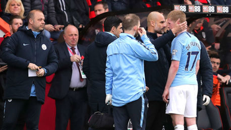 BLOW: The boss consoles Kevin De Bruyne after he was forced off