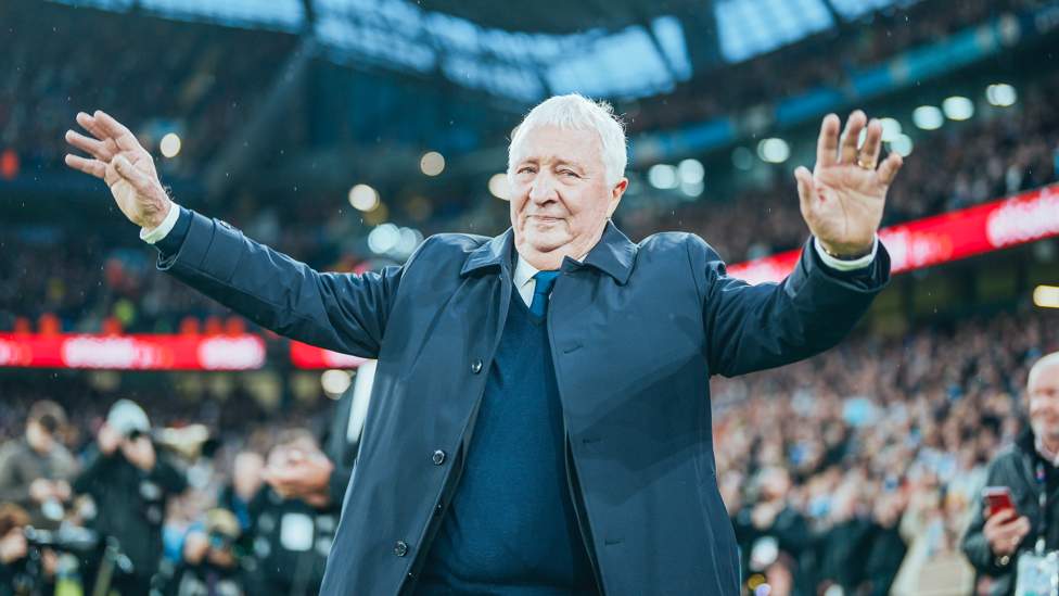 OBE : A proud moment for City legend Mike Summerbee as he walks out onto the Etihad pitch after he received his OBE from His Royal Highness Prince William for his services to football and charity earlier this month.
