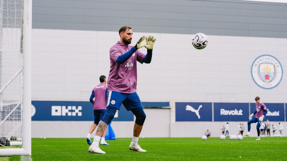 GLOVE STORY: Safe keeping for Gianluigi Donnarumma.