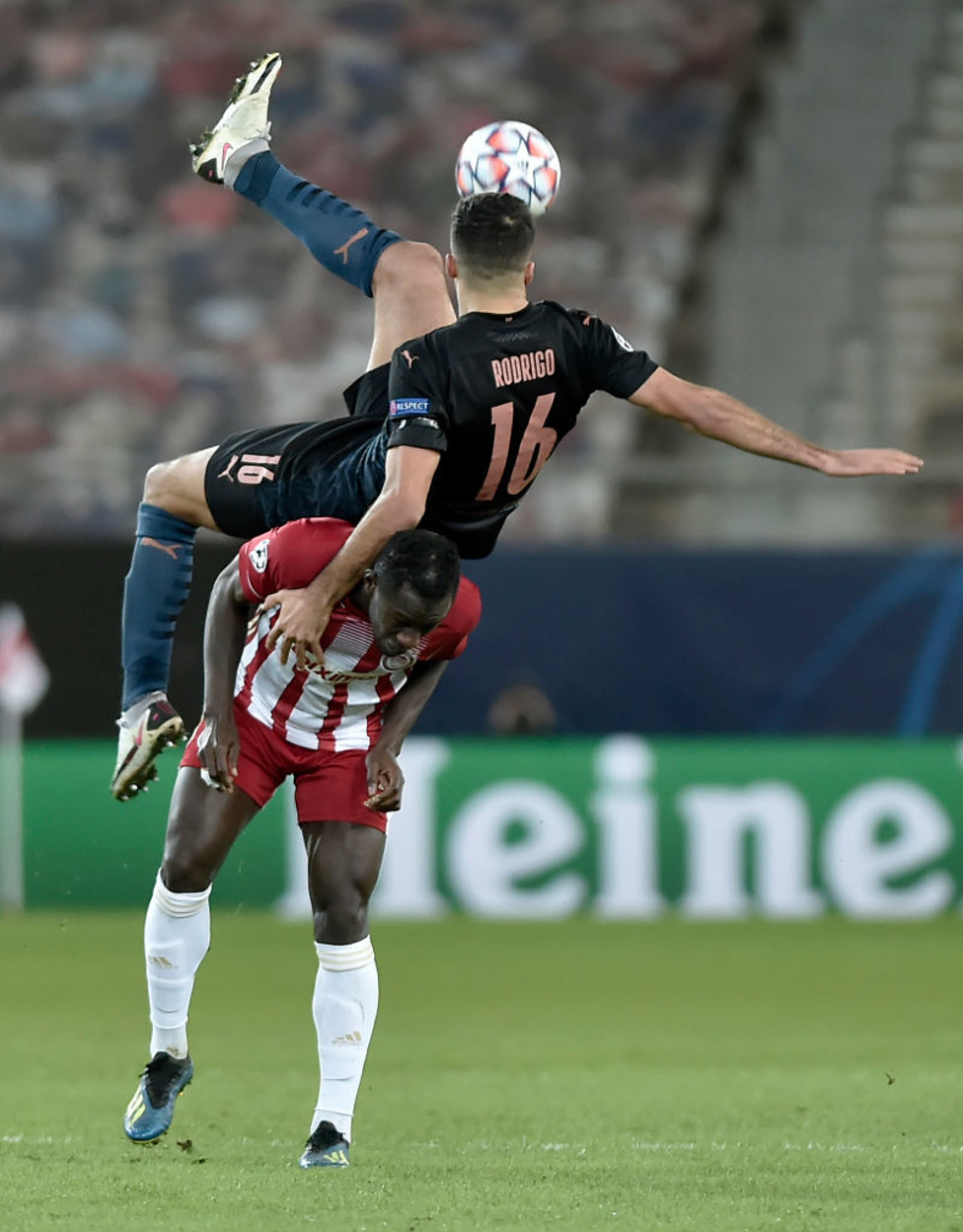 CARRY ME HOME : Rodri gets a helpful lift from Camara!
