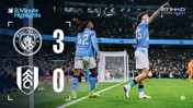 Manchester City defeats Fulham 3-0 at the Etihad Stadium. Two Manchester City players are celebrating in front of the goal.
