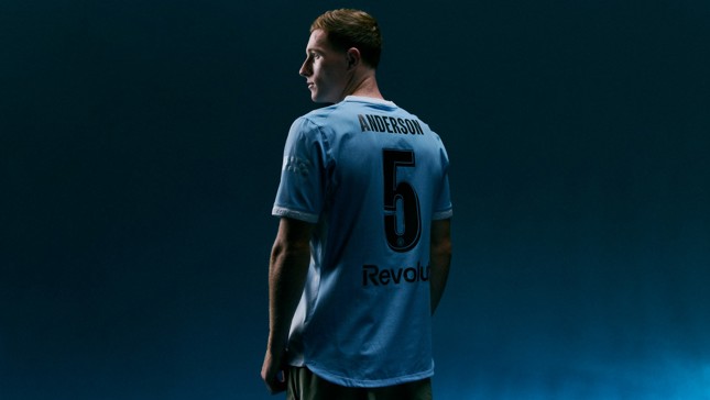 A football player with 'ANDERSON' and number '5' on the back of his jersey stands against a dark background.