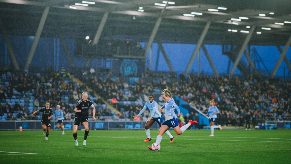 Off the mark : Hemp putting City ahead with her first goal of the season