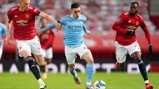 FLYING PHIL: Our midfielder races away from Scott McTominay and Aaron Wan-Bissaka