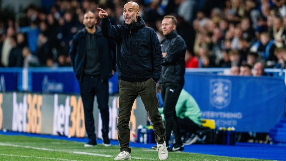 FULL FOCUS: Pep Guardiola gives out instructions from the side lines 