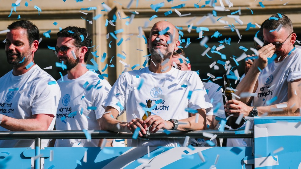 CONFETTI RAINS DOWN : Pep watches as the bus travels on