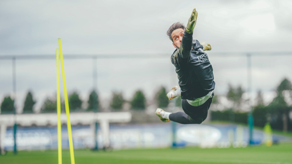 HIGH FLIER: Scott Carson is in the thick of the action during Thursday's session