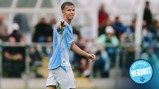 A young male football player wearing a Manchester City kit is pointing towards someone off-camera during a match. The 'Official Verdict' logo is in the lower right corner.