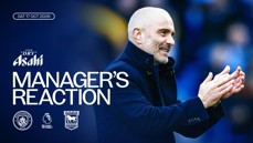 A manager claps, smiling, with text highlighting a reaction after a Manchester City vs Ipswich Town match on October 17, 2026, sponsored by Asahi.