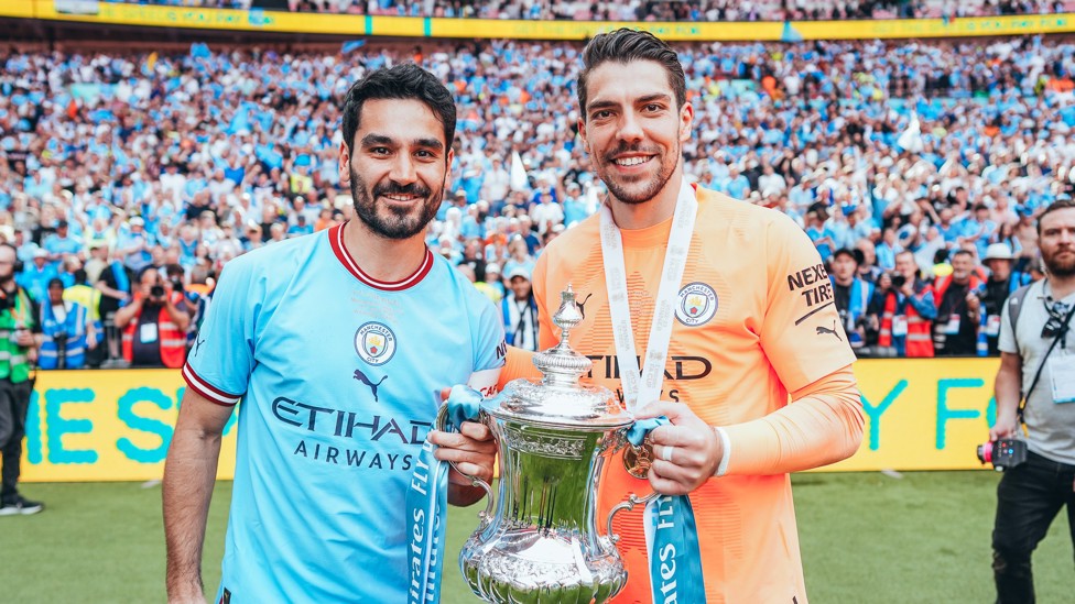 WEMBLEY DELIGHT : Posing with City captain Ilkay Gundogan after helping us beat Manchester United in the 2023 FA Cup final