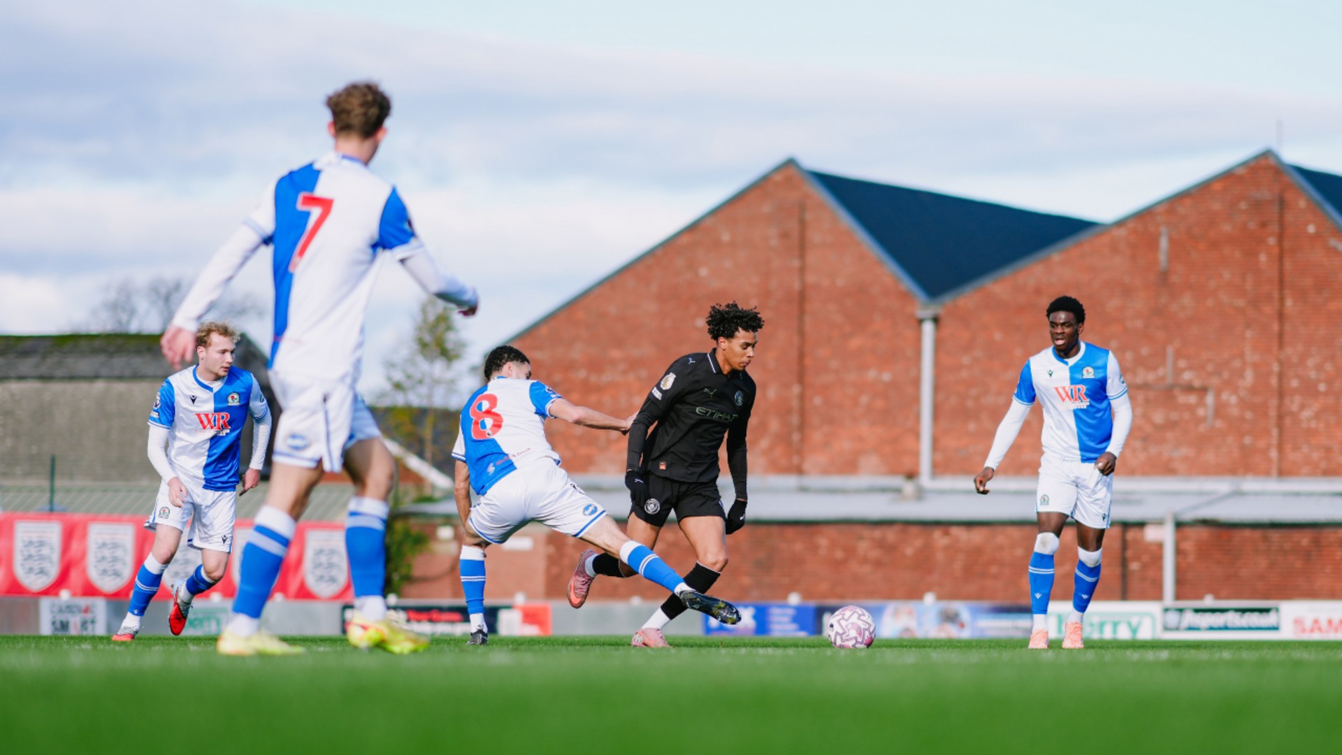 FORWARD MARCH: Emilio Lawrence runs at the Rovers defence.