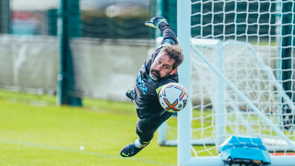 SAFE HANDS : A leaping Scott Carson makes the save 