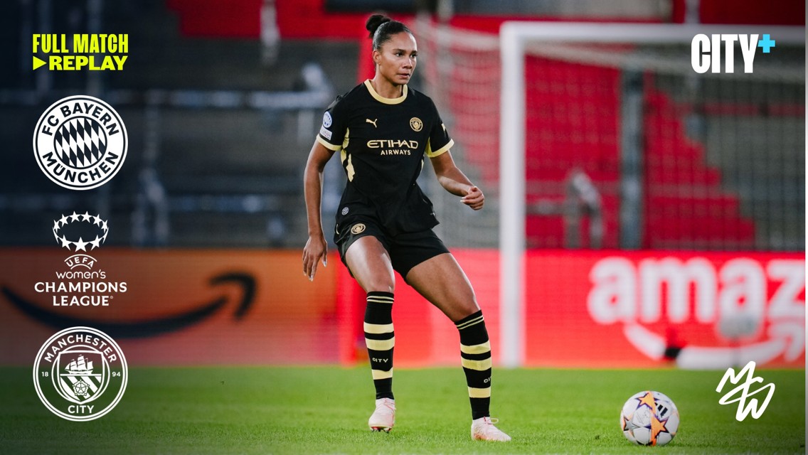 A Manchester City player in black kit with yellow accents controls the ball in a UEFA Women's Champions League match against Bayern Munich. Logos for both clubs and UEFA are visible.