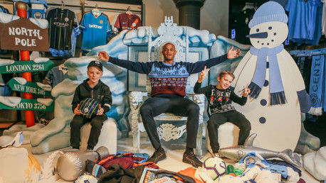 SANTA'S GROTTO: Vincent Kompany surprised two worthy young Blues and gave them some festive cheer