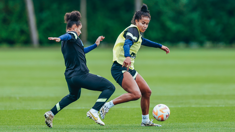 LAST DITCH : Mary Fowler tries to nick the ball off the toes of Demi Stokes.