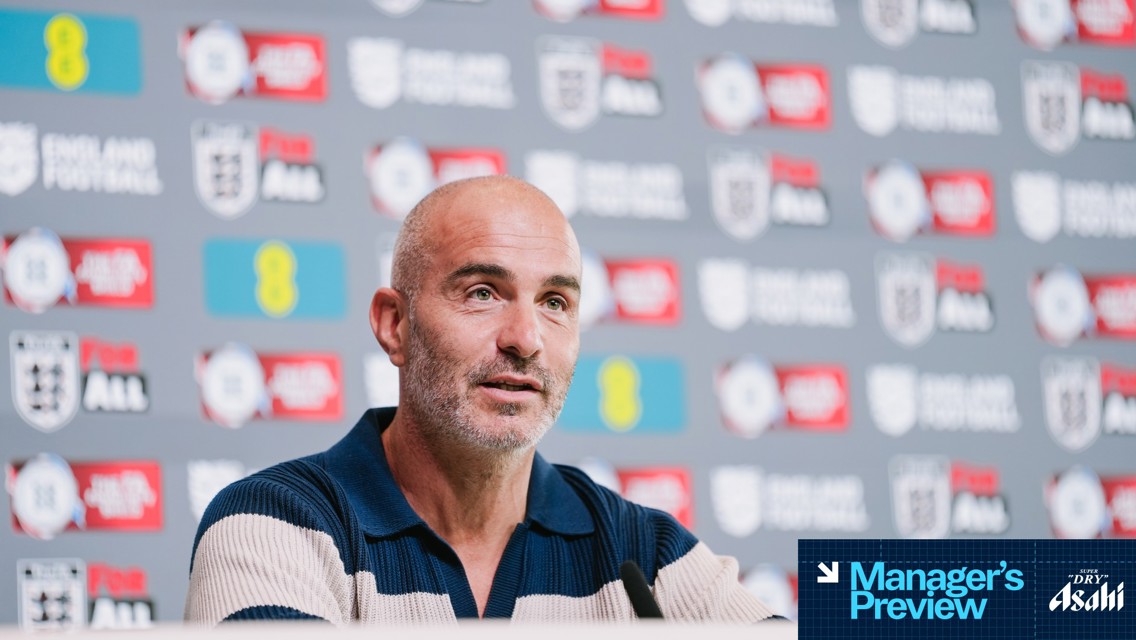 A person speaking at a press conference with a backdrop featuring 'England Football' and various logos.