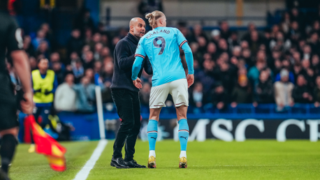 PEP TALK: Passing on instructions from the touchline.