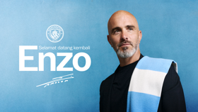 A man with a beard is wearing a scarf with Manchester City's logo, on a blue background. The text includes 'Selamat datang kembali' and 'Enzo'.