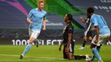 THE USUAL SUSPECTS: De Bruyne celebrates his equaliser with Raheem Sterling