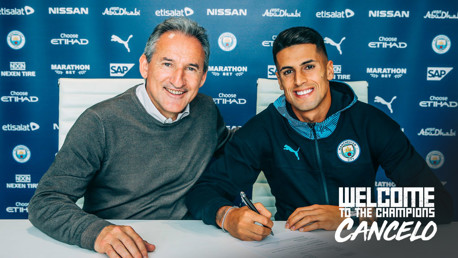 SIGNED: Joao Cancelo pens his contract with Txiki Begiristain.