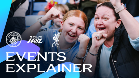Two people cheering at a Manchester City event with logos of Manchester City, Barclays WSL, and Liverpool FC.