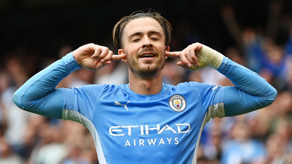 BLOCKING OUT THE NOISE : Jack Grealish celebrates goal #1 for City