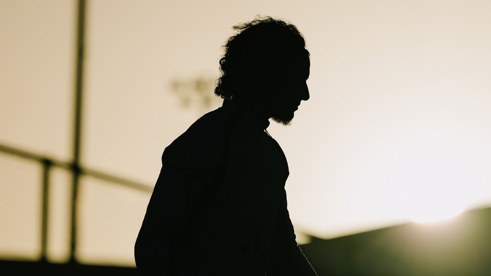 GUESS WHO : Can you figure out who the silhouette belongs to?