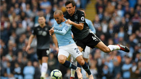 SOLID SILVA: David Silva looks to wriggle free from Burnley's Jack Crok