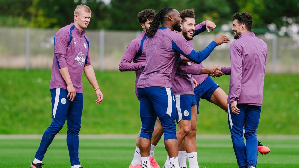 ALL TOGETHER NOW: The players gear up for the next drill.