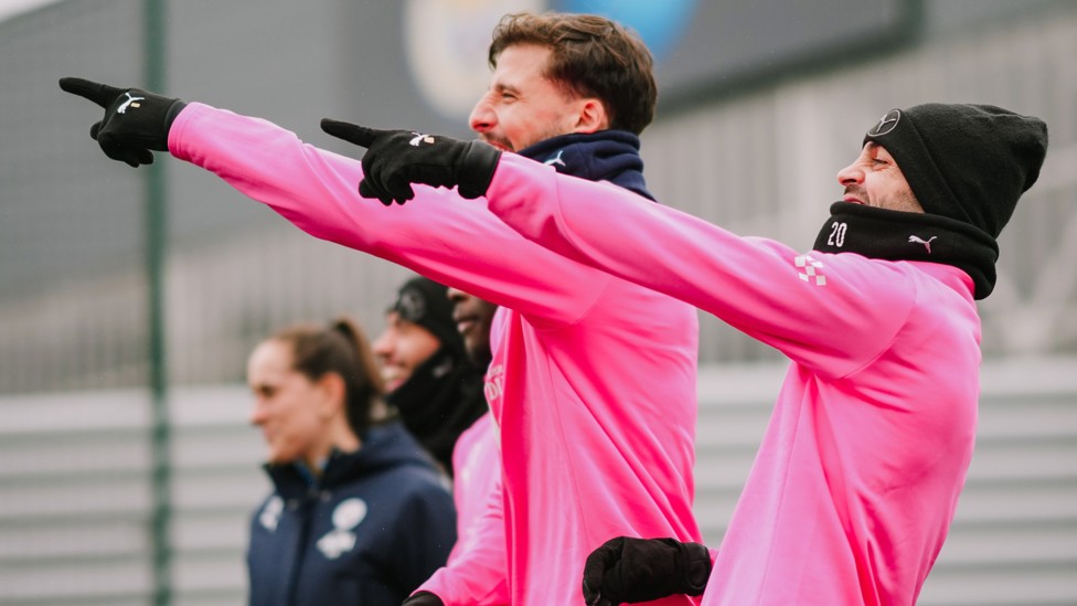 POINTING THE WAY : Ruben Dias and Bernardo Silva in good spirits as the players head outside