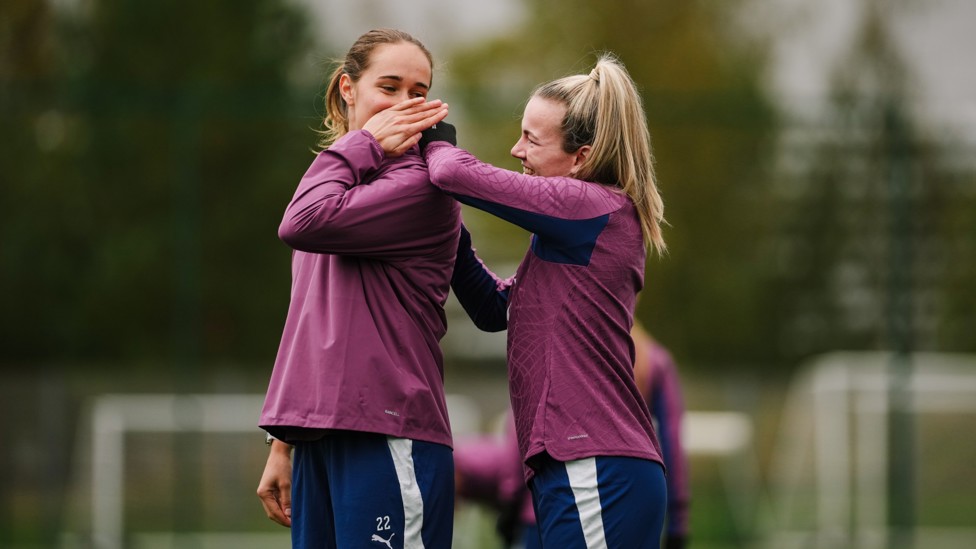 GOT THE GIGGLES : Sydney Lohmann and Lauren Hemp share a smirk