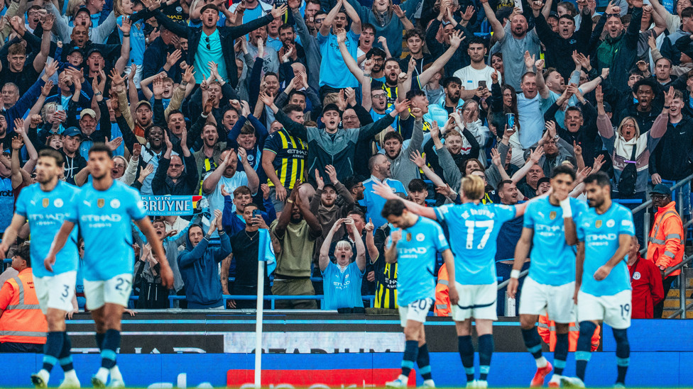 DAZZLING DE BRUYNE : Celebrates in front of the City fans.