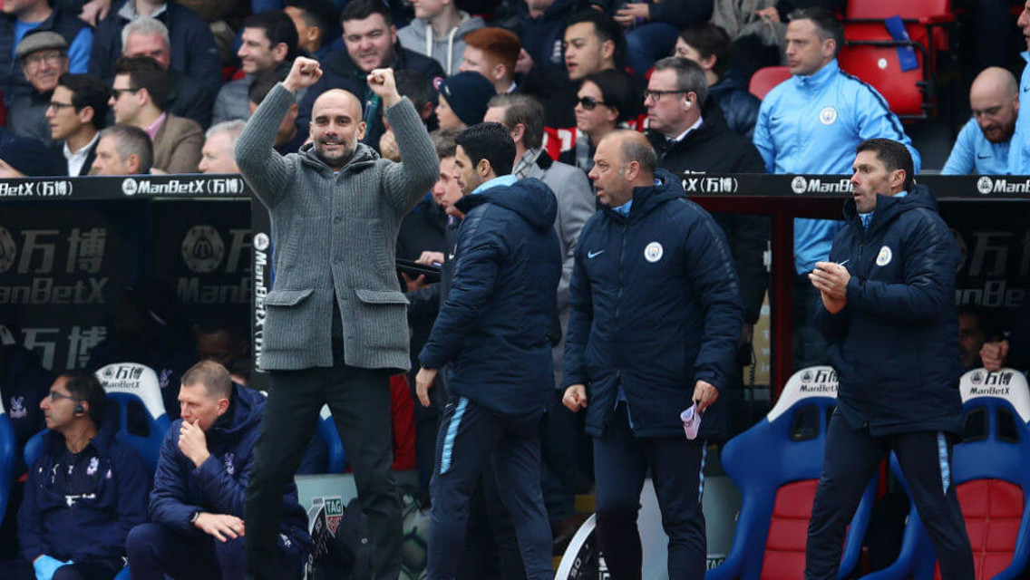 GLEEFUL GUARDIOLA: Pep celebrates City's opener.