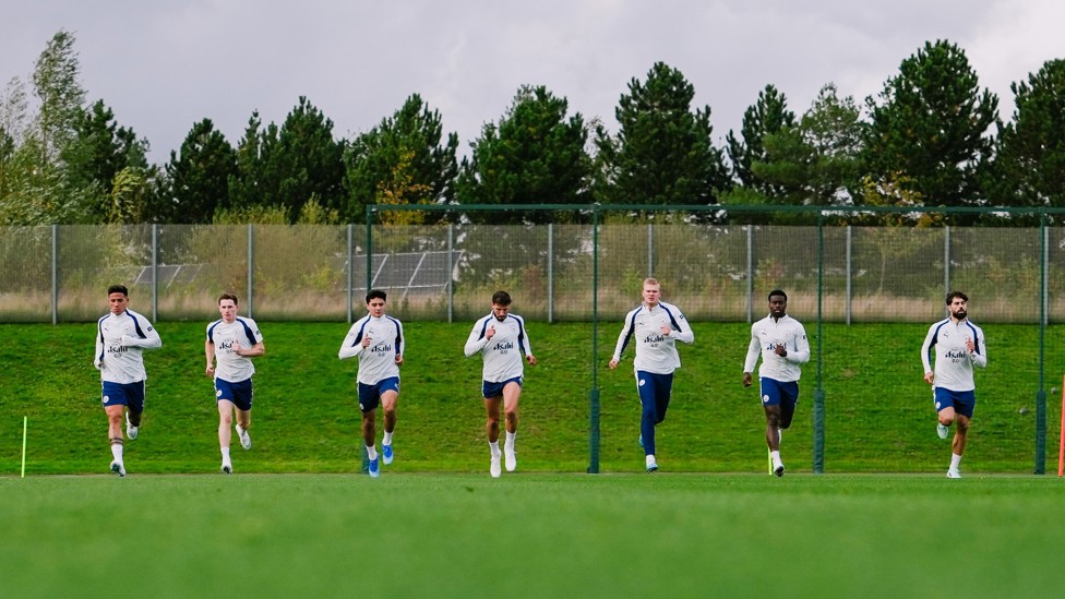 SETTING THE PACE : The team get some miles into the legs.